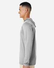 A man shown in profile wearing a light gray long-sleeve hooded shirt against a plain light gray background.