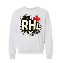 A light gray crewneck sweatshirt featuring a graphic print on the front with the letters 'RHL' in beige over a black paint splatter background, a red maple leaf, a black silhouette, and a black fern frond.