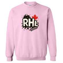 A light pink crewneck sweatshirt featuring a central graphic with the letters 'RHL' in white, a black military helmet, a red maple leaf, and a black fern frond on a splattered black background.